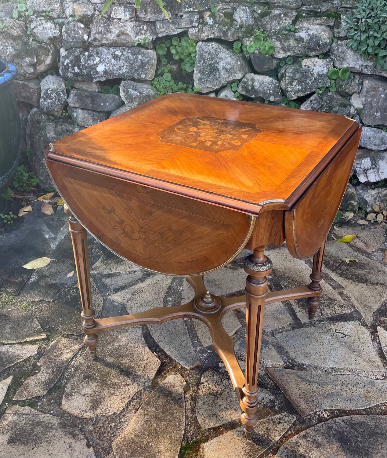 Center table decorated with marquetry of leaves and flowers in Louis XVI style, 19th century period