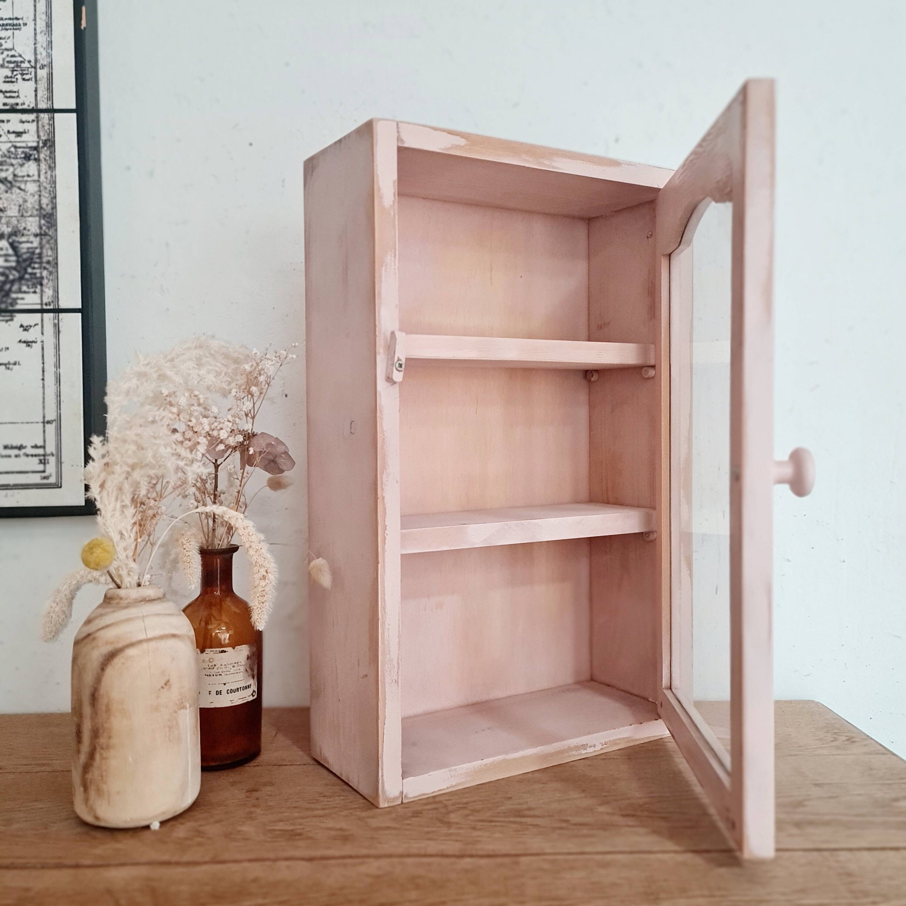 Medicine cabinet in patinated pink wood