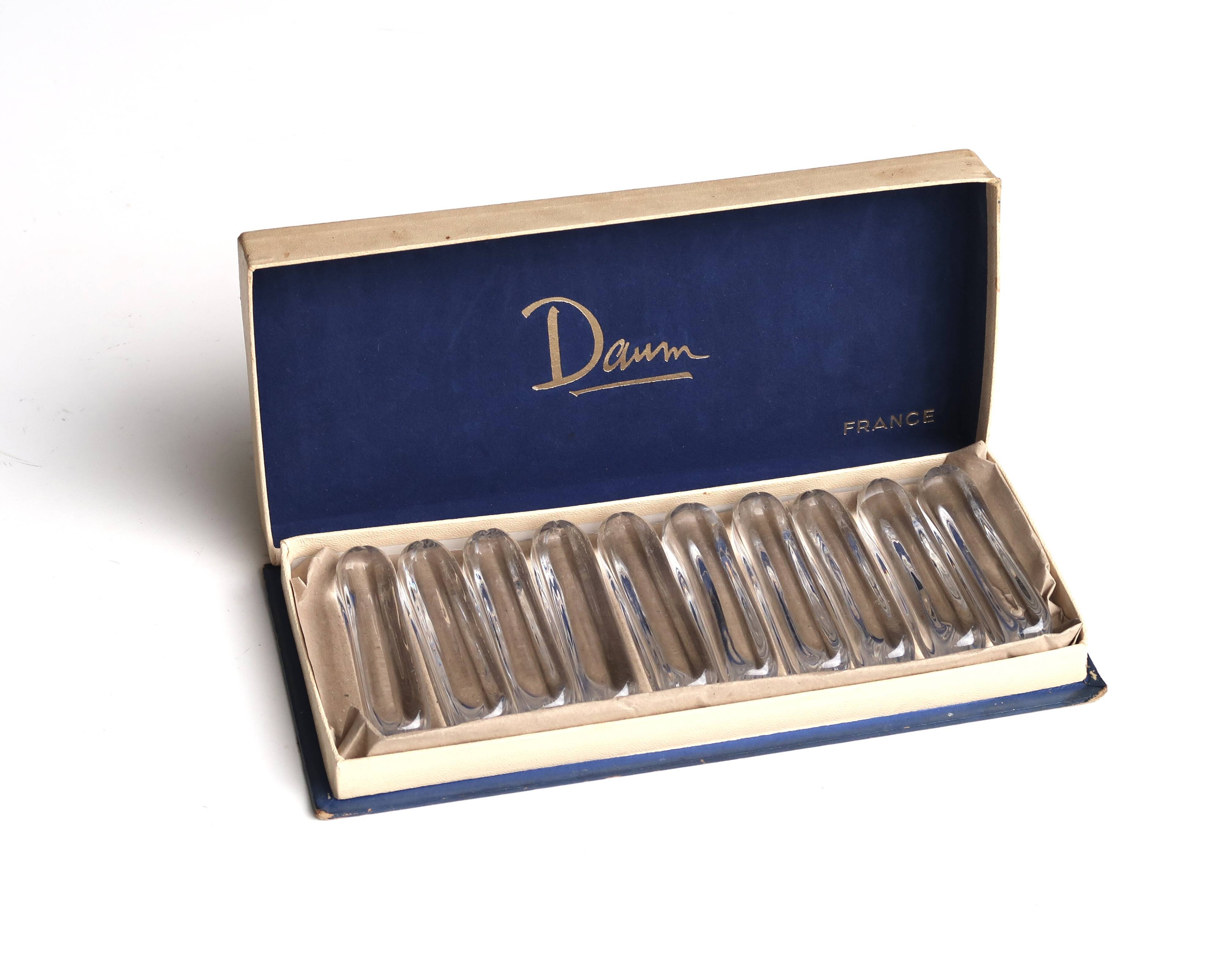 Set of 10 knife rests in a Daum France box, crystal, 1960s.