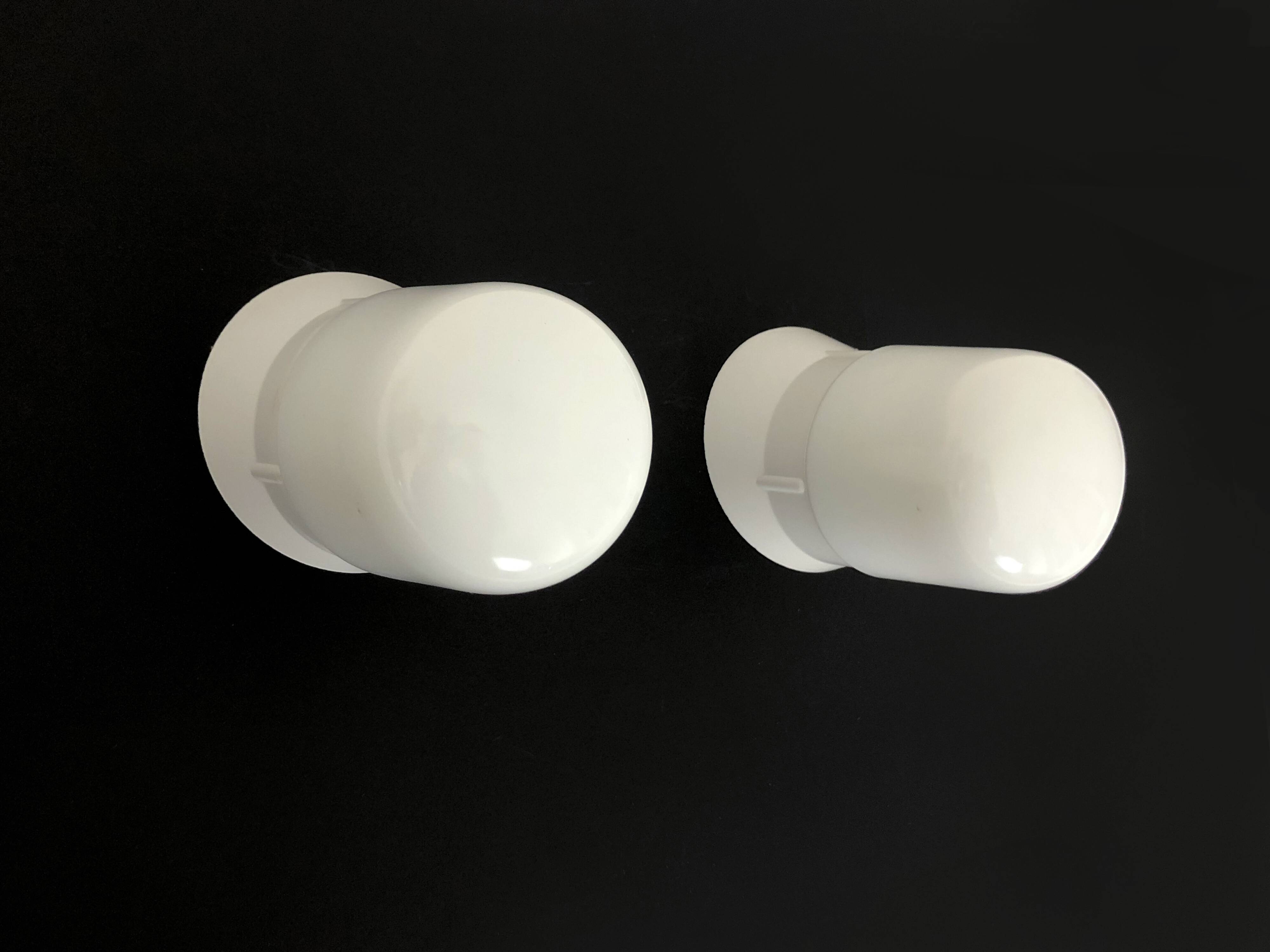 Pair of white oblique wall lights by Arno. 60s