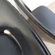 2 chairs in black skai compass legs Louis Paolozzi