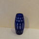 Blue and transparent glass vase, has vintage geometry patterns