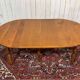 Round cherry wood table, 6 feet, Louis Philippe style with 2 extensions.