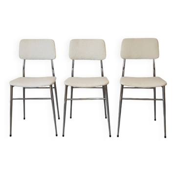 3 white patterned Formica chairs