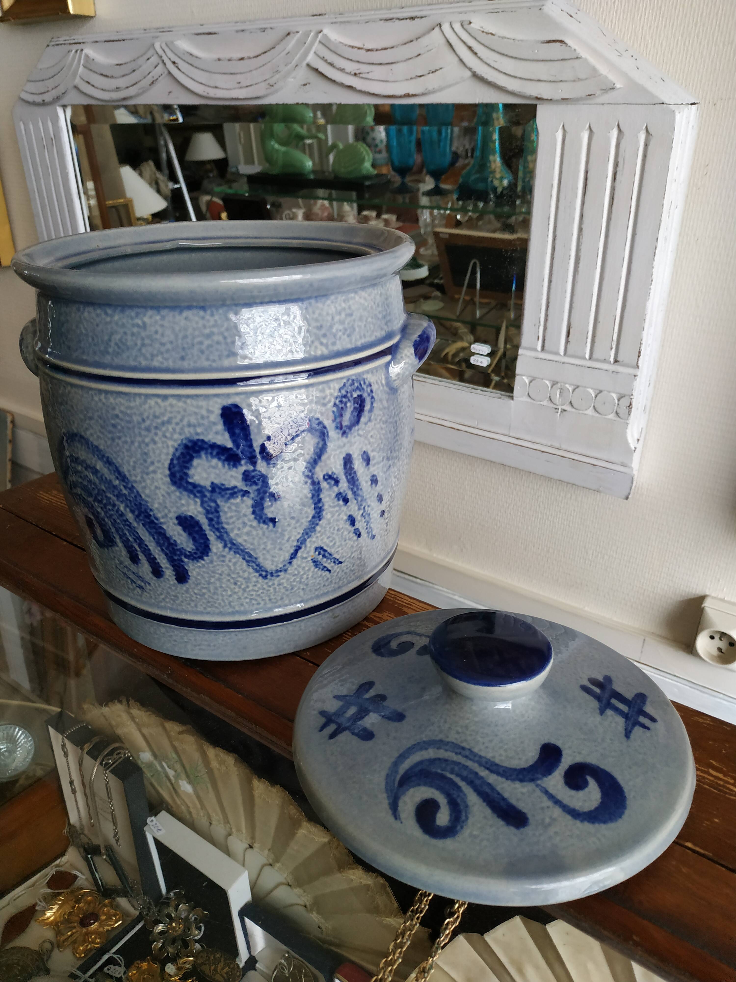 Covered sandstone pot