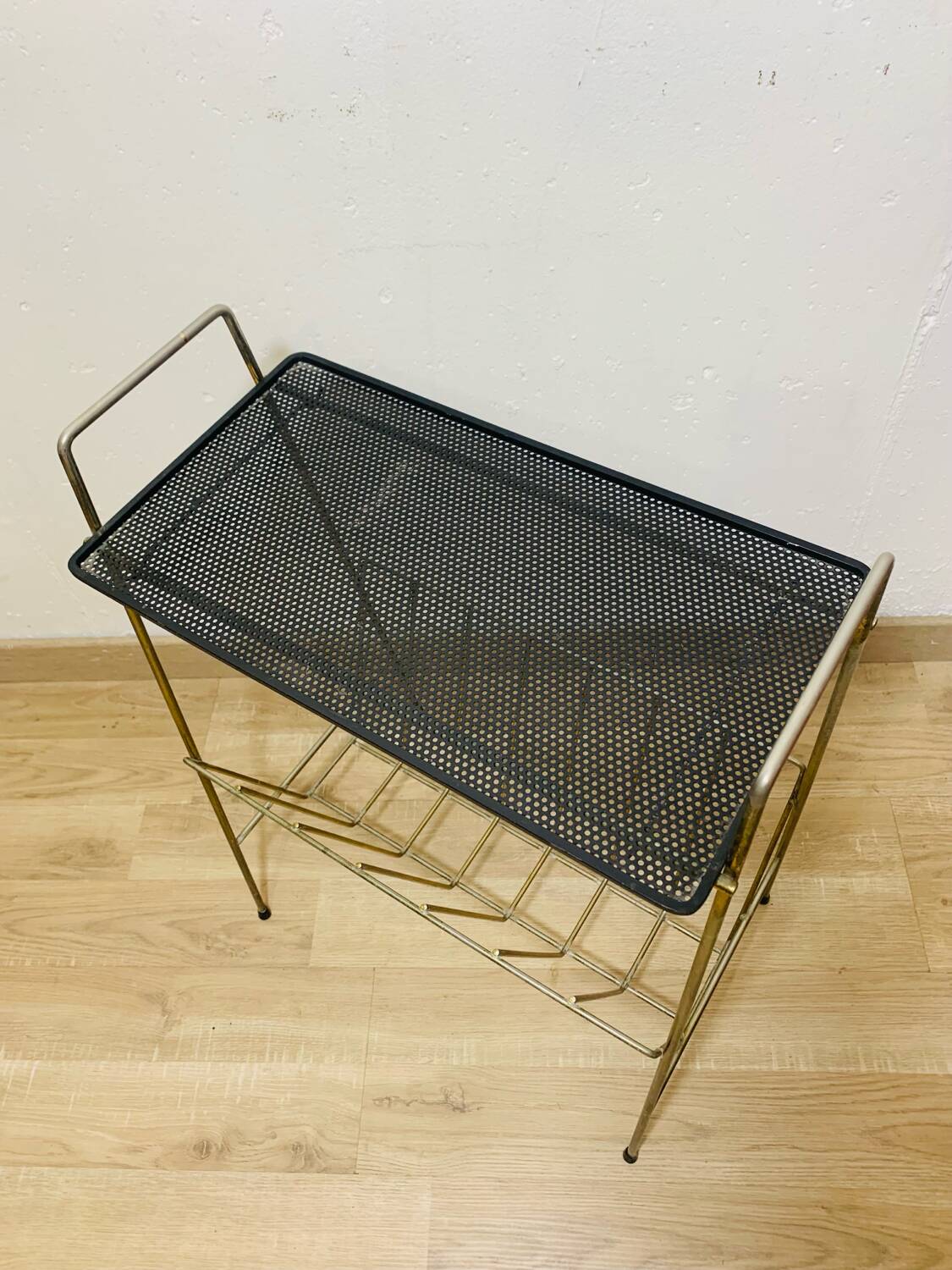 Perforated metal magazine rack