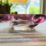 Empty pocket in pink tinted glass