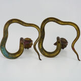 Pair of old bronze cobra candle holders with detailed engraving. Around 1950