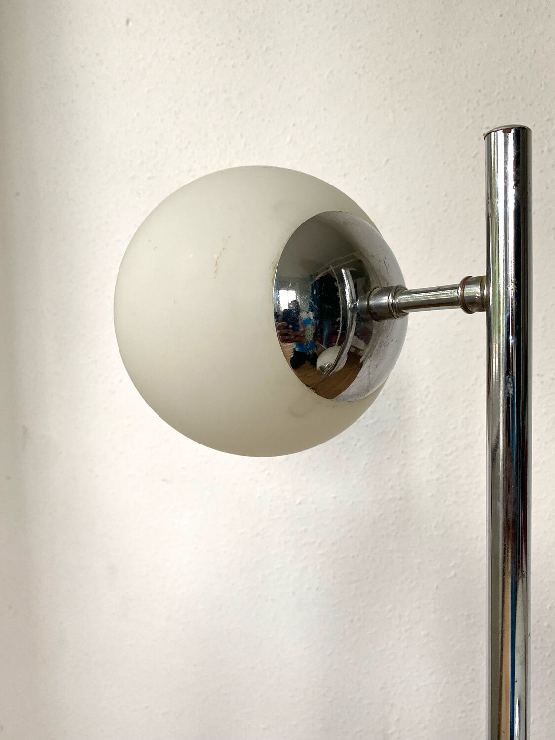 Vintage floor lamp has two opaque glass spheres