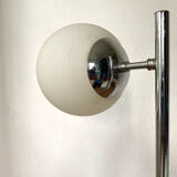 Vintage floor lamp has two opaque glass spheres