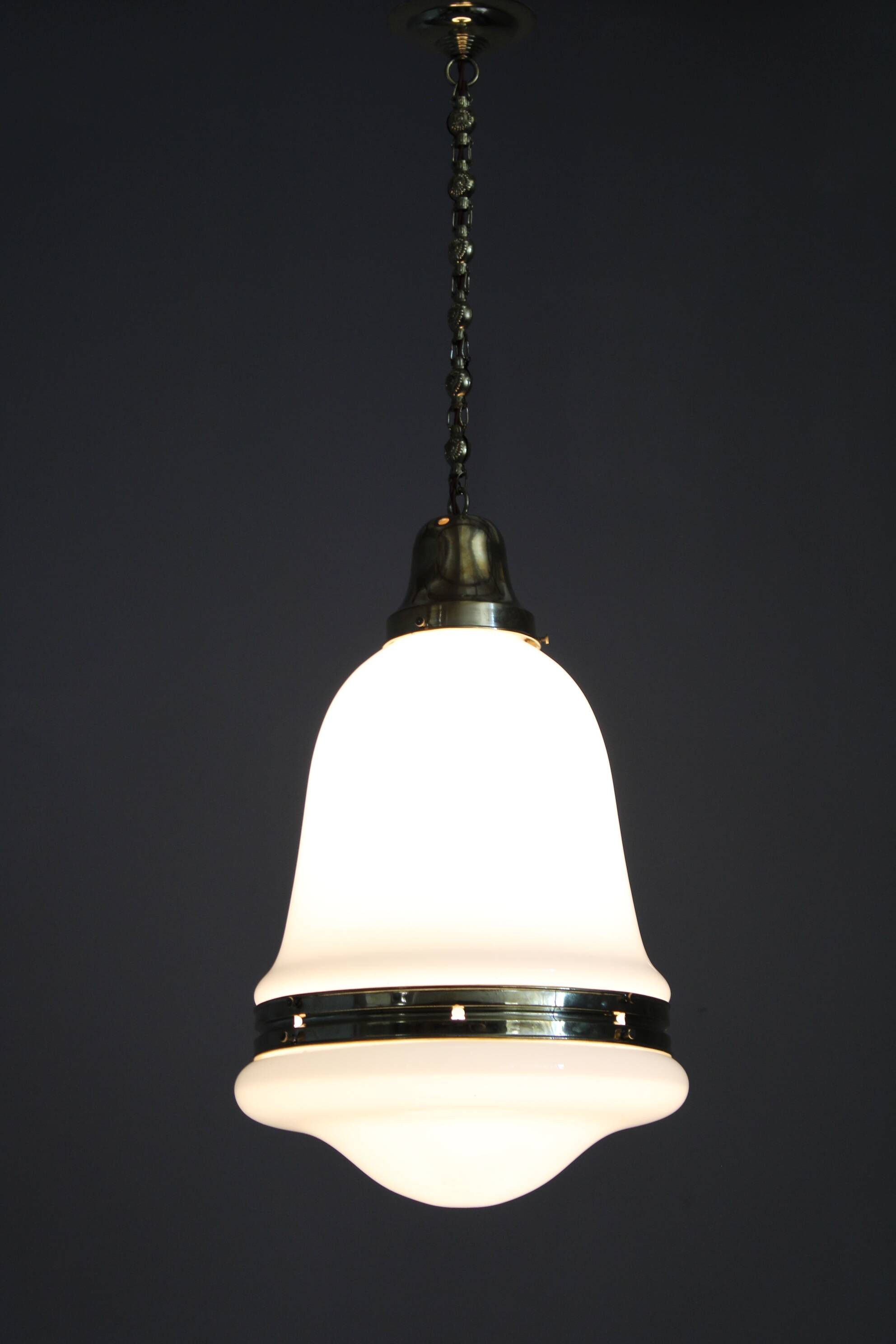 Pair of 1930s Peter Behrens Luzette pendants in opaline glass and brass