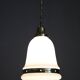 Pair of 1930s Peter Behrens Luzette pendants in opaline glass and brass
