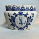 Delft, decorative pot planter with boat and windmill design from the early 20th century.