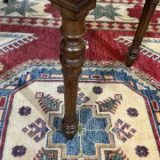 Louis XVI style desk from the late 19th century in walnut with a leather top.
