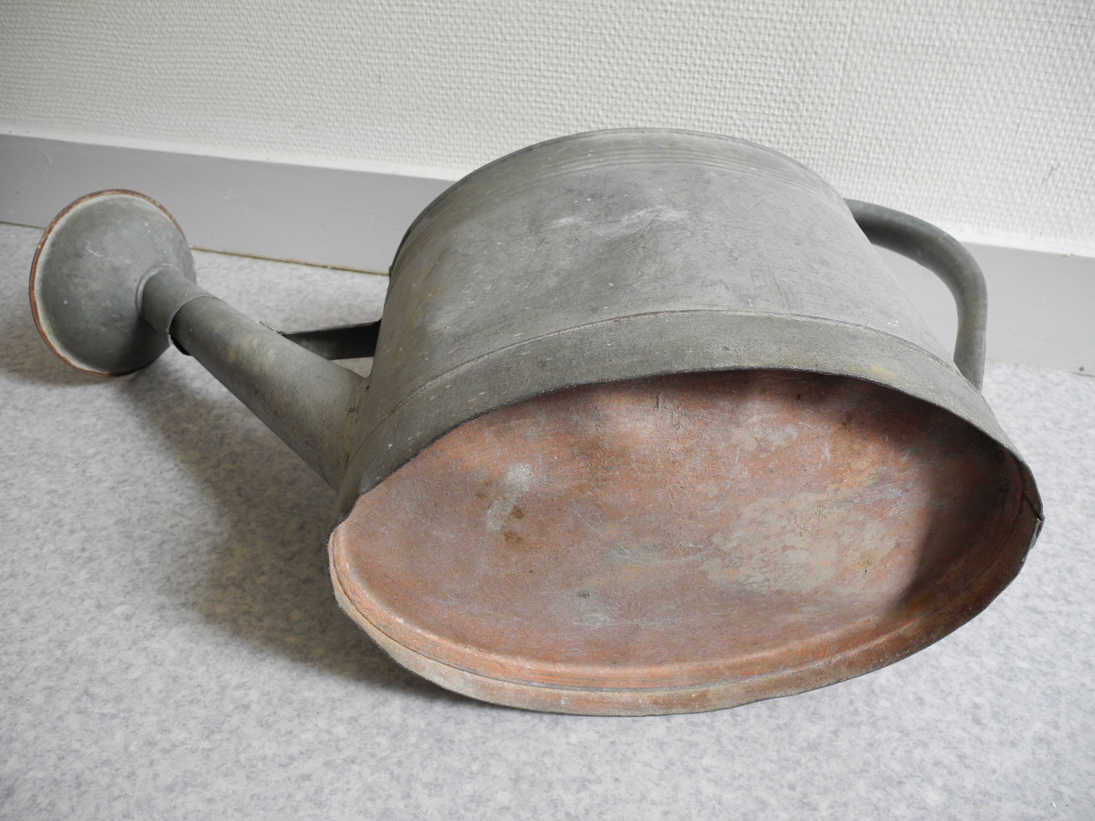 old zinc deco watering can