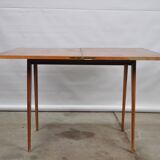 Folding folding table with compass legs