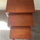 Trio of teak and chrome metal nesting tables from the 60s-70s