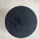 Black mango wood tripod side table with a semi-spherical top, height: 45 cm, diameter: 44 cm.