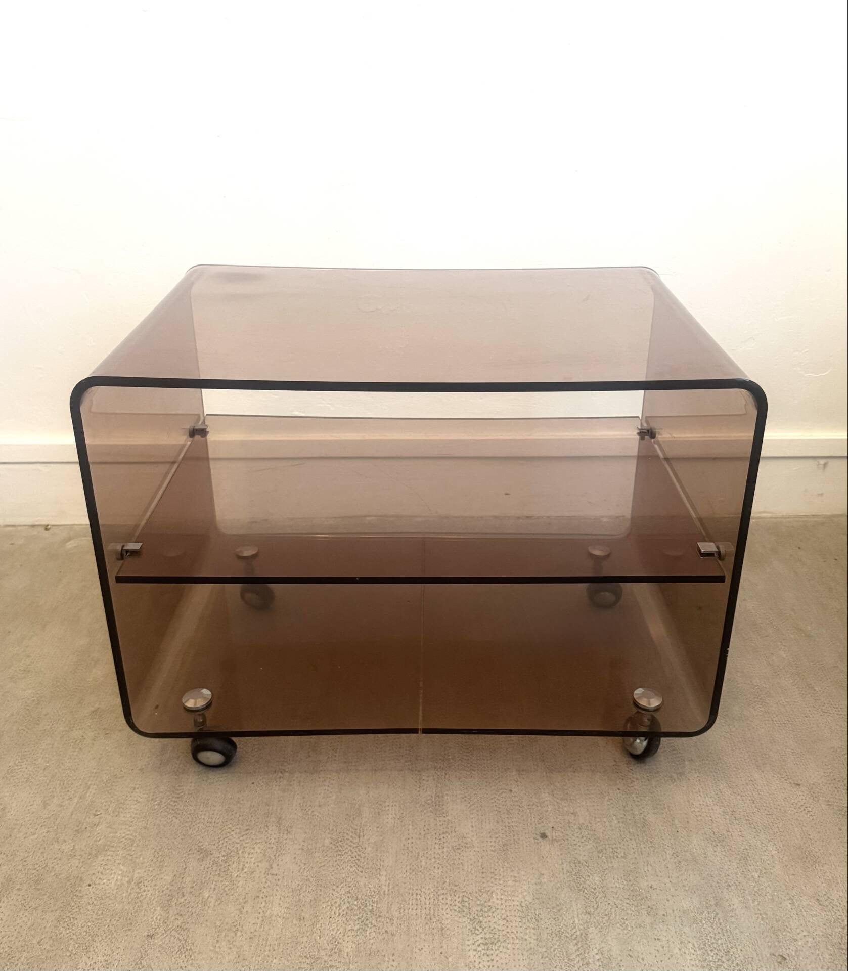 Coffee table / serving table in smoked plexiglass by Michel Dumas