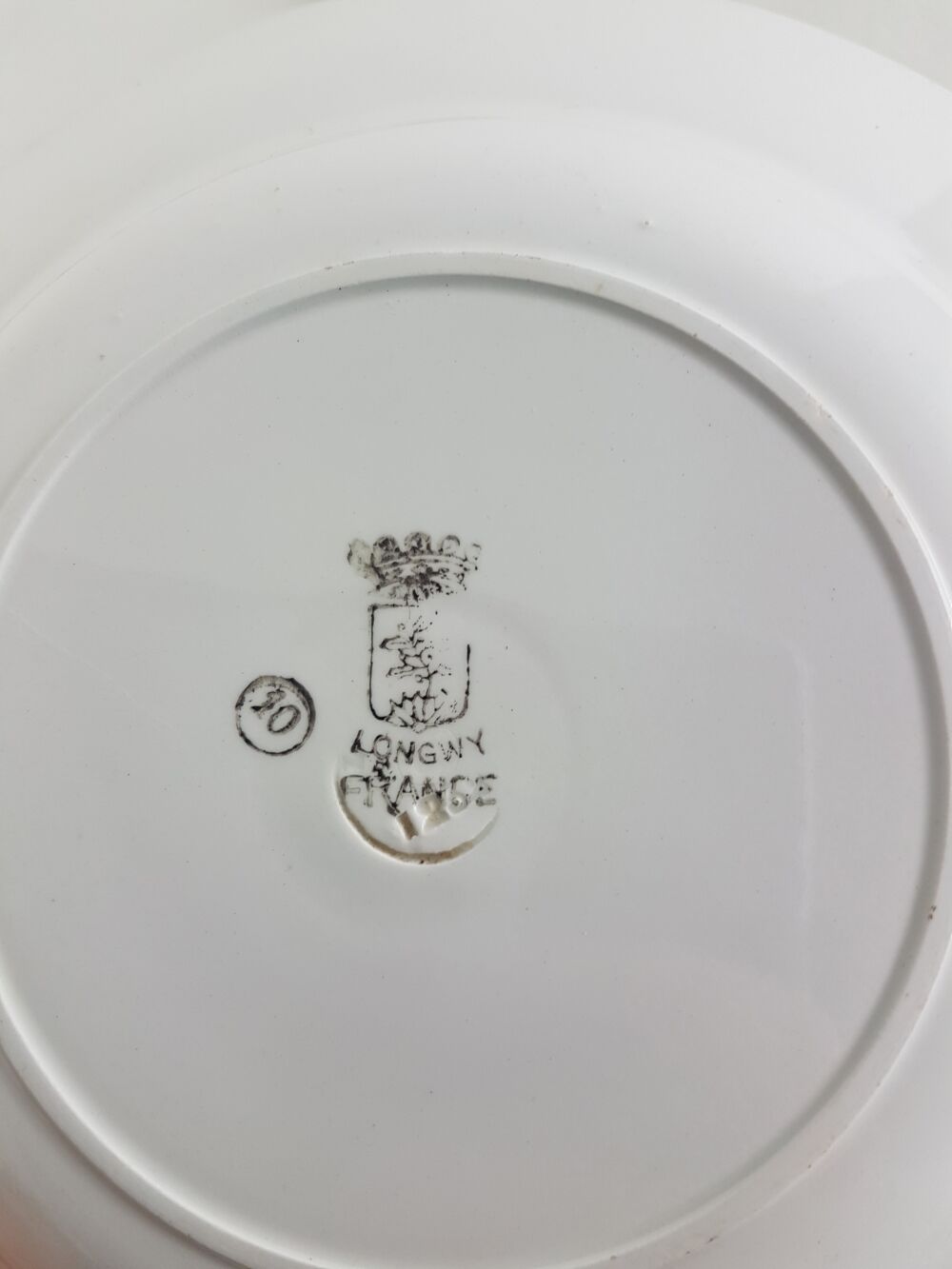 12 hollow plates made of Longwy earthenware