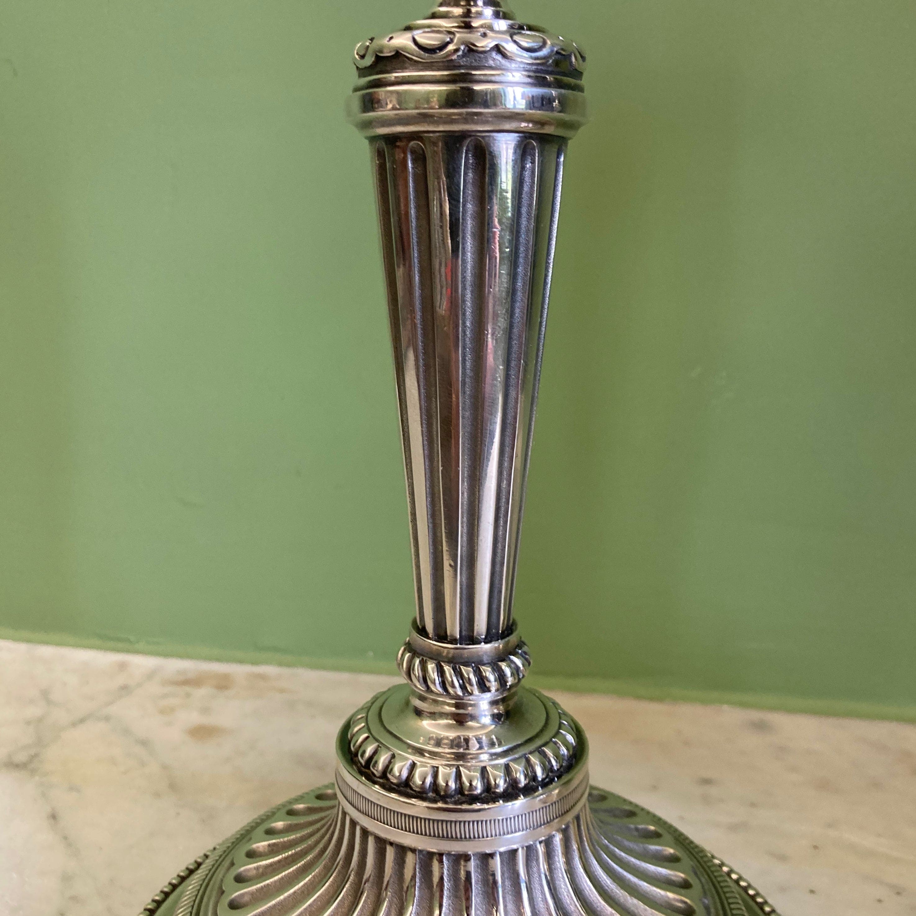 Pair of silvered bronze candlesticks from the 19th century in Louis XVI style signed Voisenet.