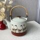 Théière japonaise vintage en porcelaine