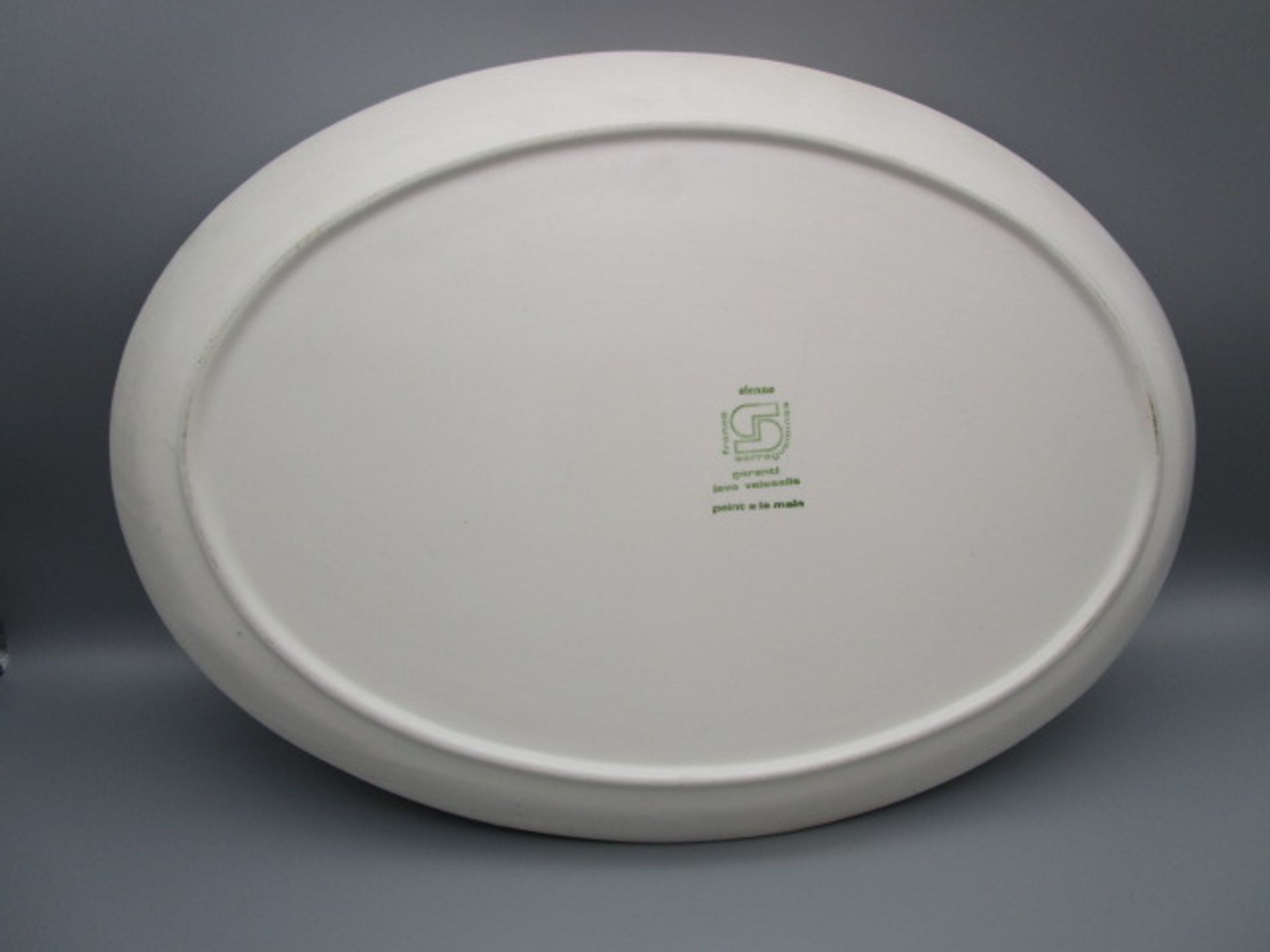 Plat vintage en faïence de Sarreguemines imitation grès