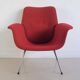 Red armchair with metal legs