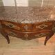 Commode sauteuse galbée de style Louis XV en marqueterie et bronzes dorés (