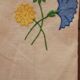 Vintage square linen tablecloth hand-embroidered with floral patterns — 1950s/60s