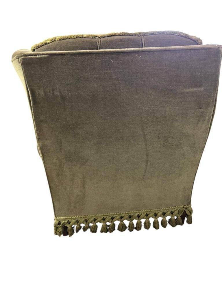 Vintage green club chair with fringes