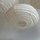 Average suspension in rattan and natural linen, Japanese-style, oval and flattened, H30 D4.