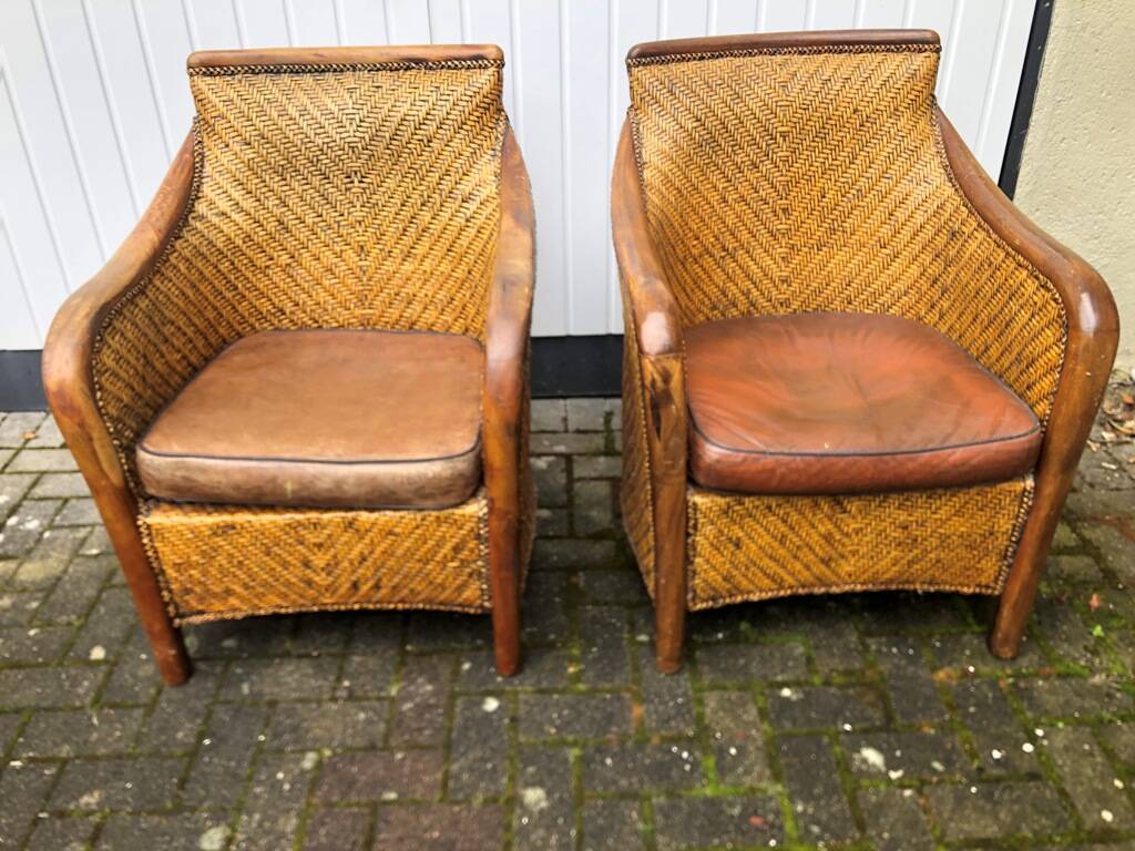 2 colonial armchairs in wood, rattan and leather, 1950s