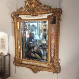 Mirror with parecloses