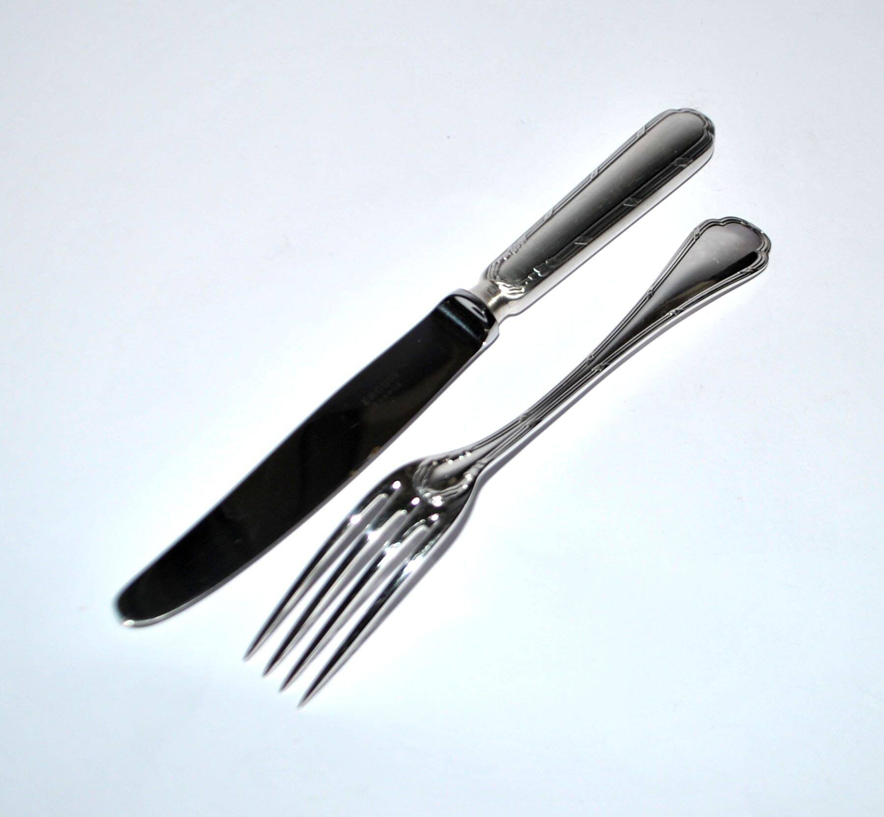 Ercuis set of 2 Trianon metal-plated dessert cutlery with crossed ribbon for cheese starter.