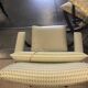 Rocking lounge chair made of fabric suitable for outdoor use.
