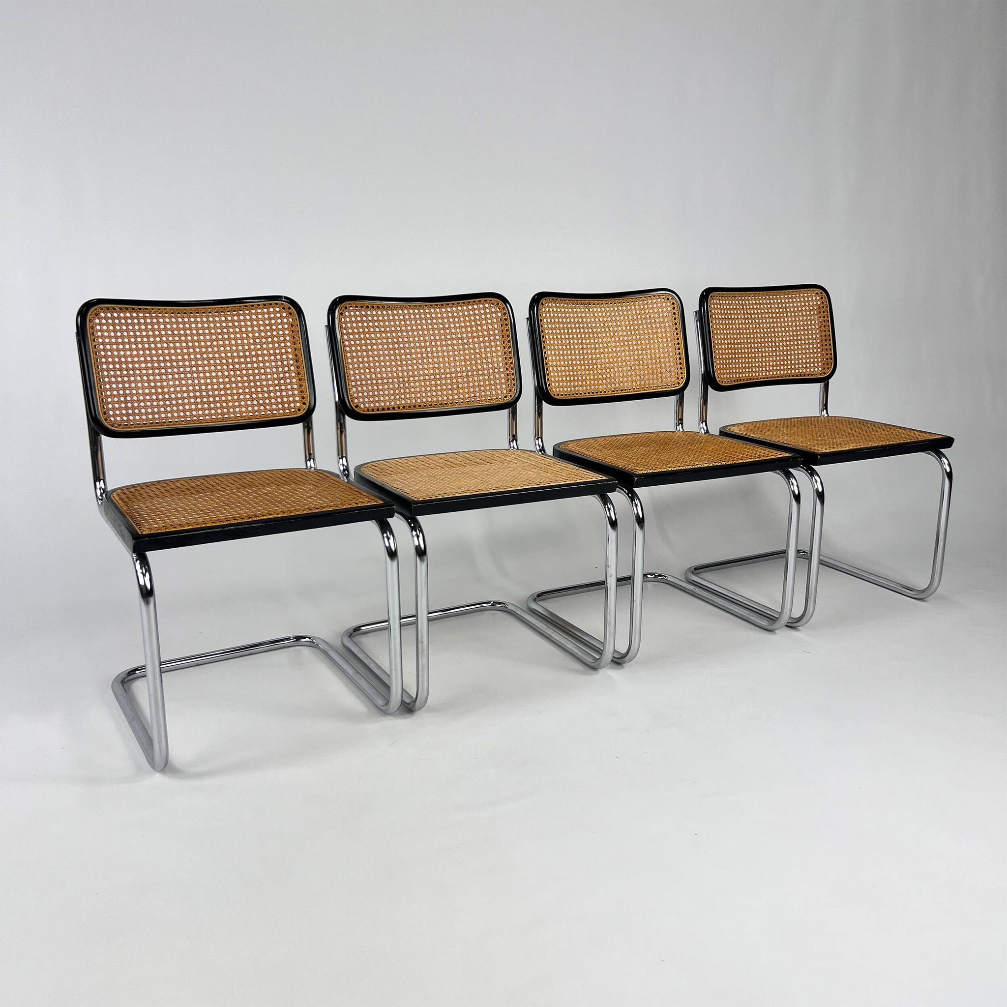 Set of 4 Tubular Frame and Cane Cantilever dining chairs, Italy, 1970s