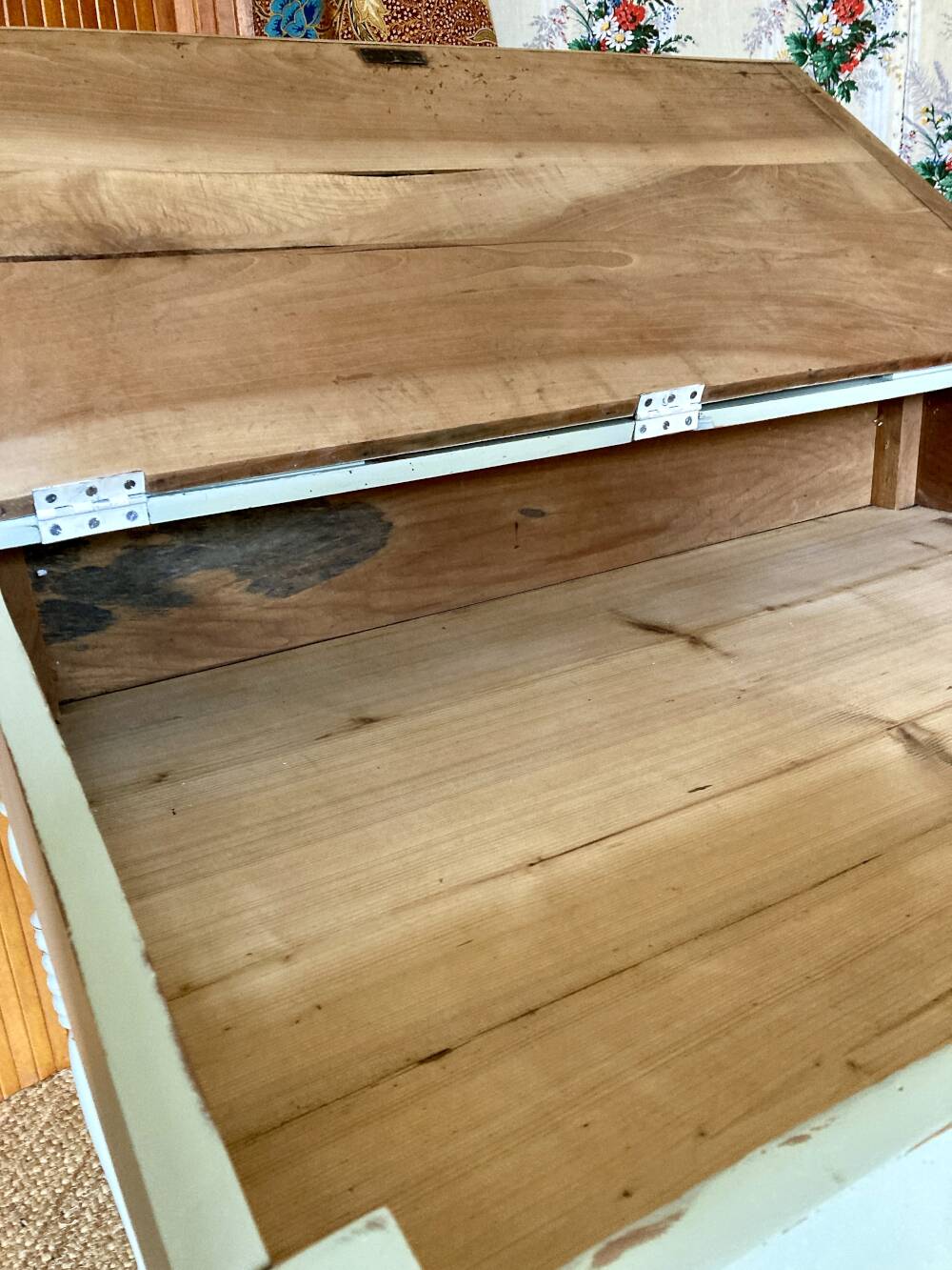 Antique wooden sloped desk, with a drop-down front and turned legs.