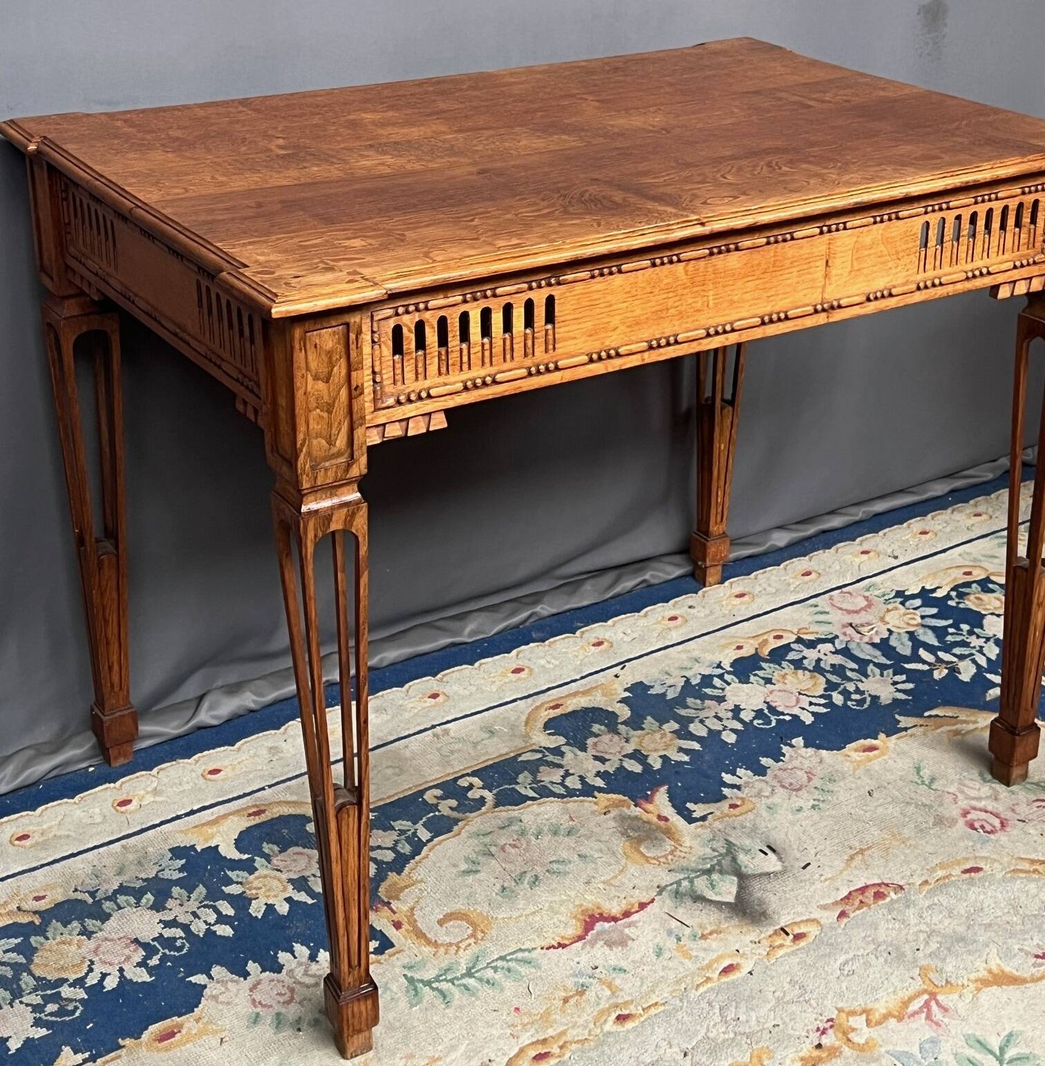 Solid oak coffee table in Louis XVI style.