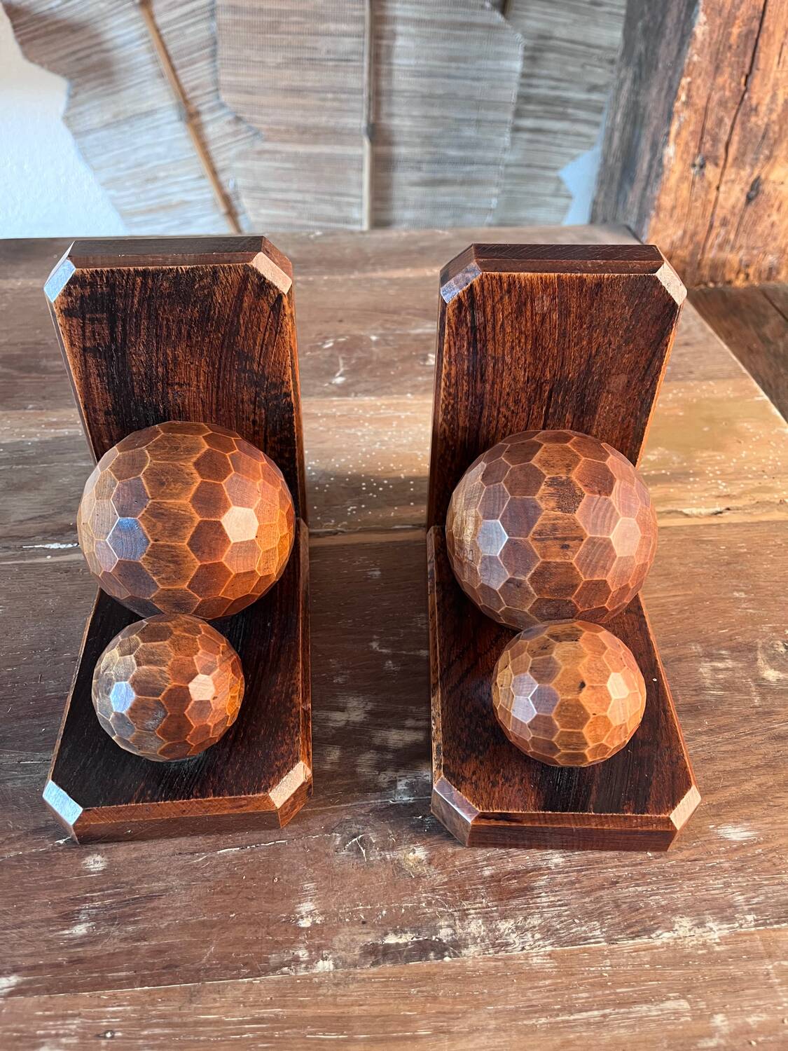 Pair of carved wooden bookends