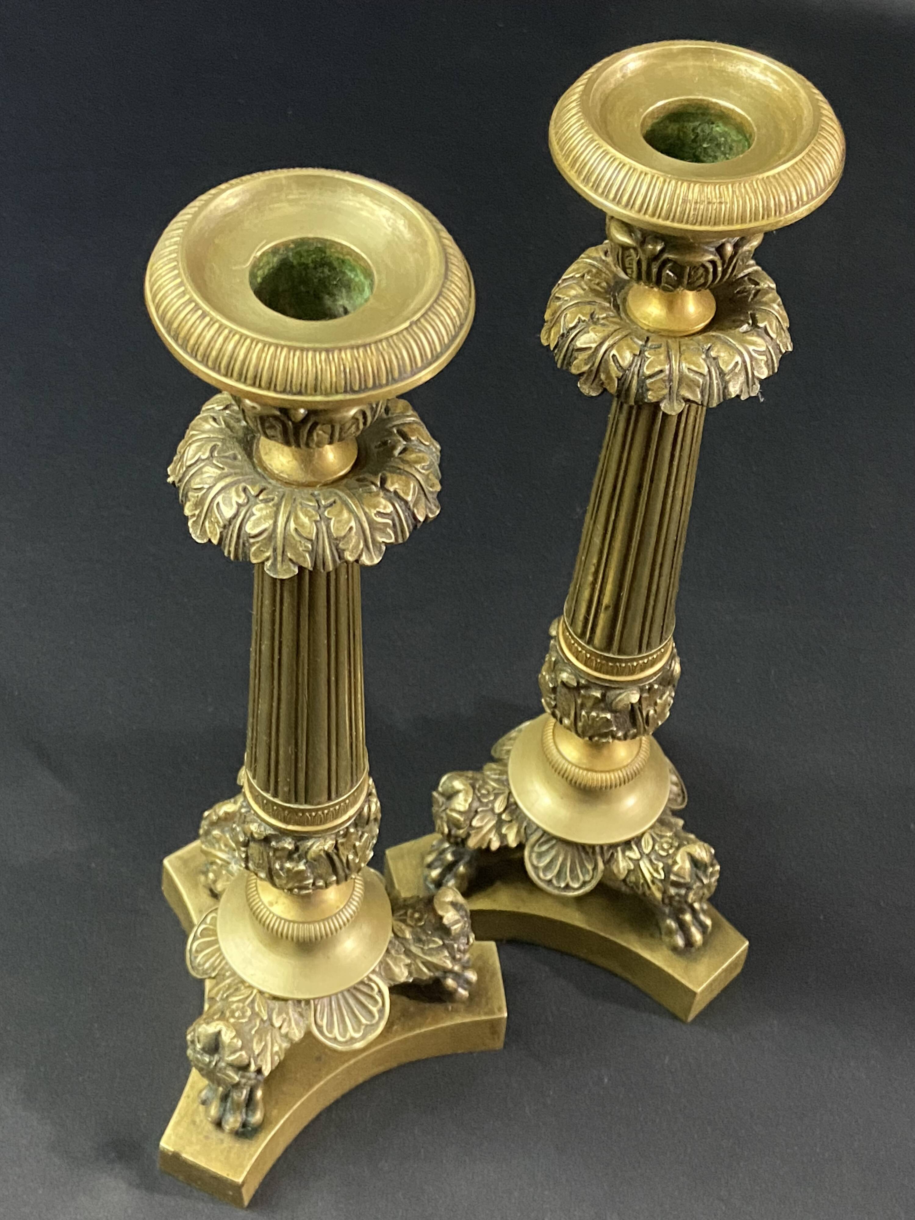 Pair of gilt and chiseled bronze candlesticks from the Restoration period