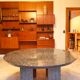 Round table in polished granite 10 seats