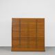 Vintage industrial oak filing cabinet with several drawers, 1930s.
