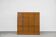 Vintage industrial oak filing cabinet with several drawers, 1930s.