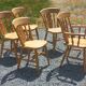 Set of 4 chairs and 1 armchair in mountain style.
