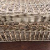 Wicker suitcase.