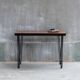 Console solid wood on black pins feet