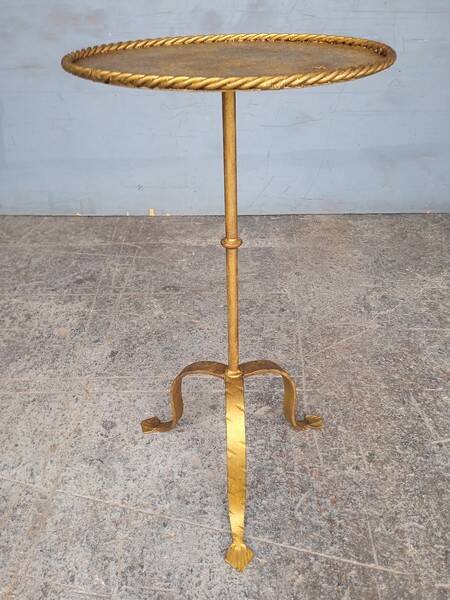 Minimalist brutalist gold metal pedestal table