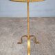 Minimalist brutalist gold metal pedestal table