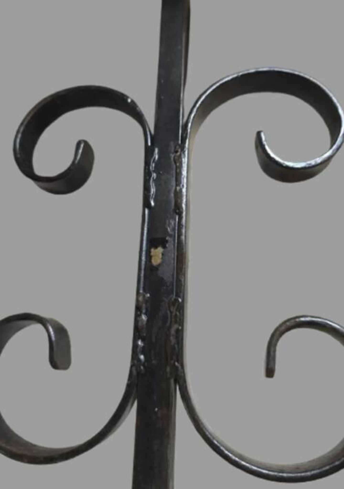Pair of wrought iron candlesticks with cast bronze ball, 1970s.